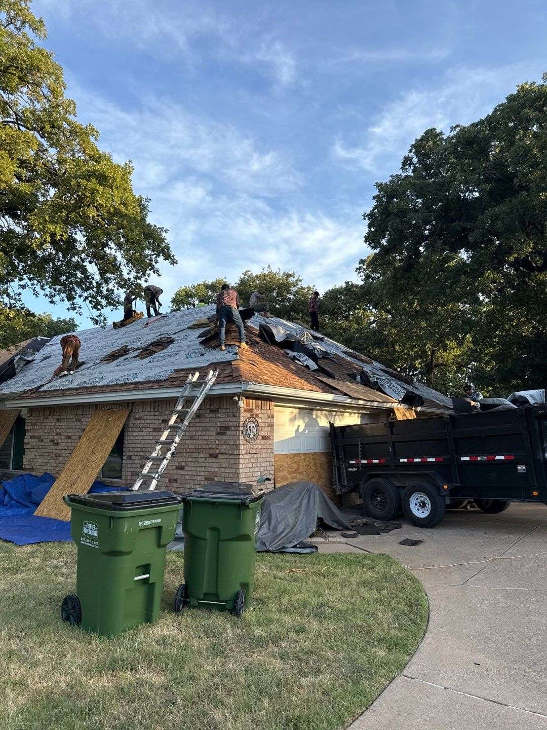 APGC roofing crew installing new shingle roof in Burleson TX