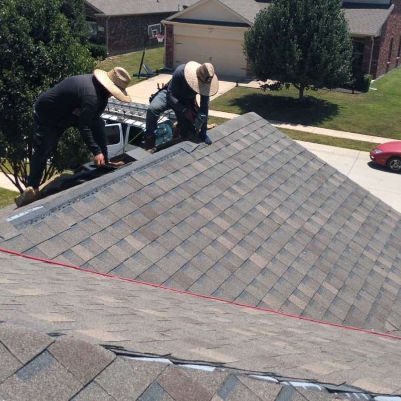 American Prime General Construction crew installing a new shingle roof in North Texas